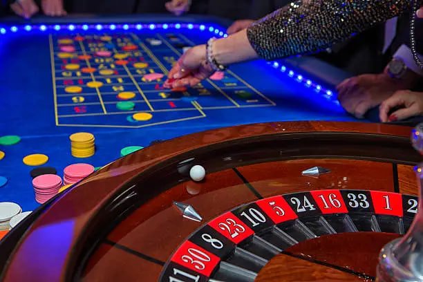Live dealer roulette wheel spin captured from multi-angle camera feed